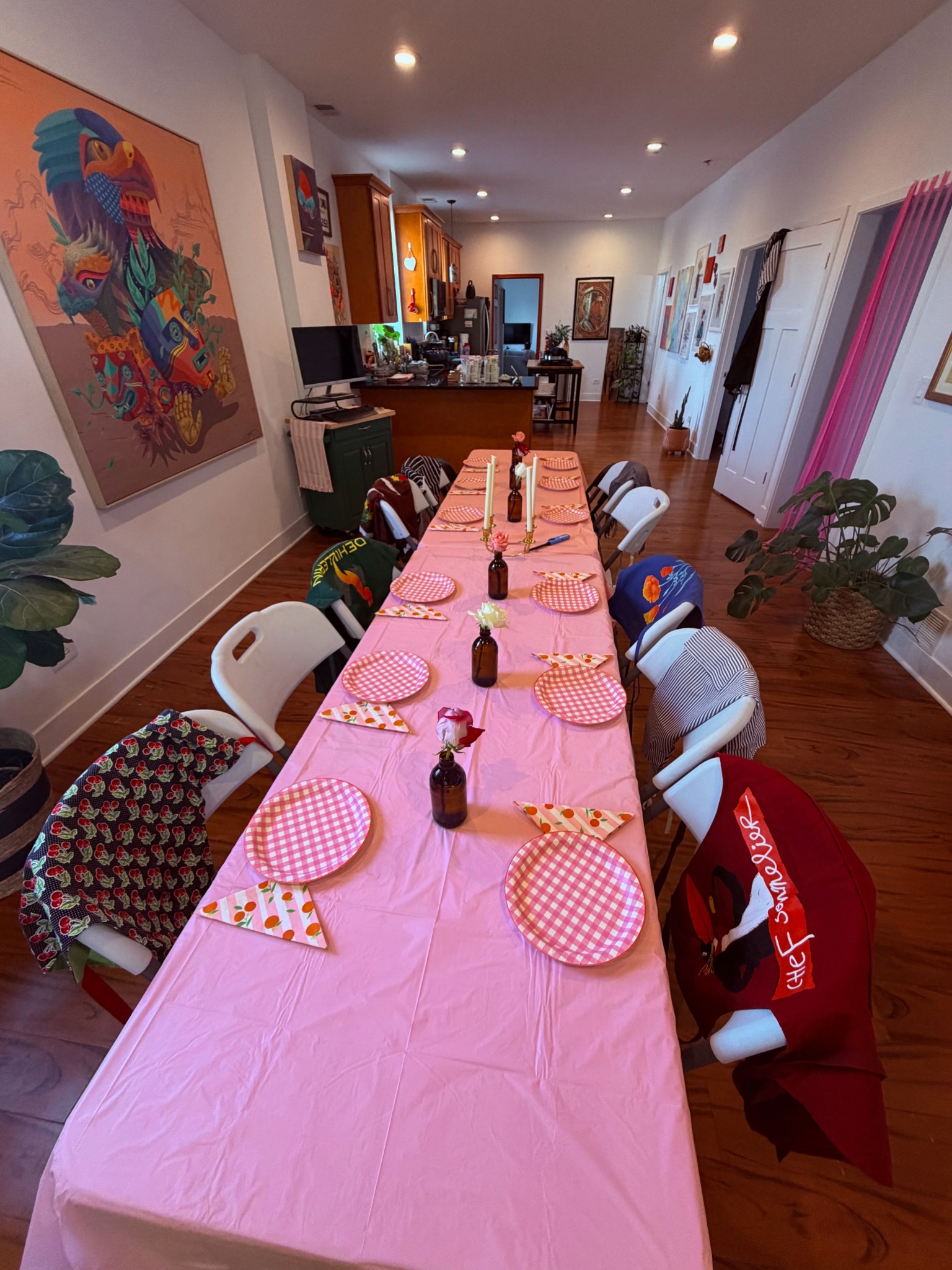 Long dining table set for a gathering inside La Buena Vida's Pilsen space